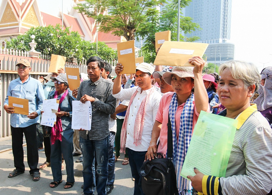 Farmers call for resolution of decade old land grab disputes